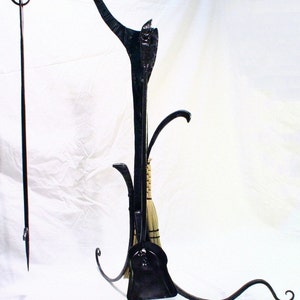 Hand wrought Art Nouveau fireplace tools. Great for larger fireplaces and outdoor firepits. Keep indoors when not in use.