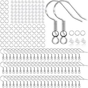 May include: A selection of silver-coloured earring-making components, including numerous earring hooks, jump rings, earring backs, and two pairs of earring hooks with a ball and loop design. The items are arranged on a white background.
