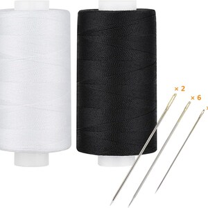 May include: Two spools of thread, one white and one black, with three sewing needles. The needles are of varying sizes, with the quantities of each needle type indicated. The thread spools have white bases.