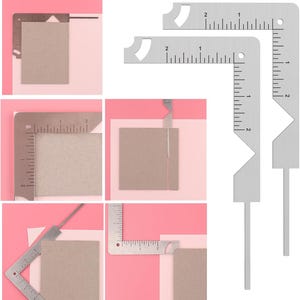 May include: A set of silver metal right angle rulers with measurement markings in inches. The rulers are shown in various positions, some measuring the corners of a square piece of cardboard. The background is pink and white.