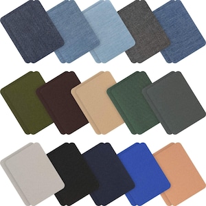 May include: A collection of rectangular fabric patches in various colors, including denim blues, olive green, brown, tan, and black. The patches are arranged in rows, showcasing a variety of shades and textures for crafting or repair projects.