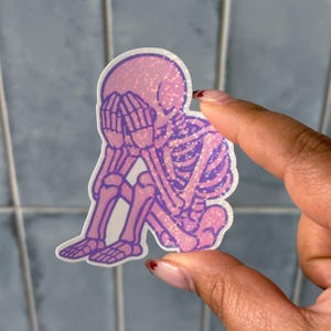 Sad Skelly Vinyl Sticker - Sad Skeleton, emotional sticker, overstimulated, glitter finish, glossy sticker, emotional support stickers