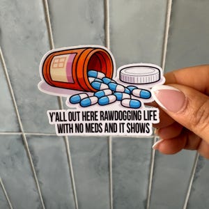 Y’all Out Here Rawdogging Life With No Meds & It Shows Sticker - Funny Mental Health Sticker, Pill Bottle Vinyl, Dark Humor, Antidepressants