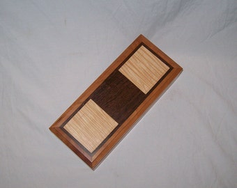 Handcrafted works of Art with a functional flair. Wooden trinket or keepsake box.9''x4 1/2,,x2 3/4''