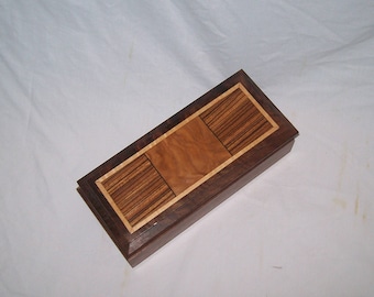 Handcrafted works of Art with a functional flair. Wooden trinket or keepsake box.