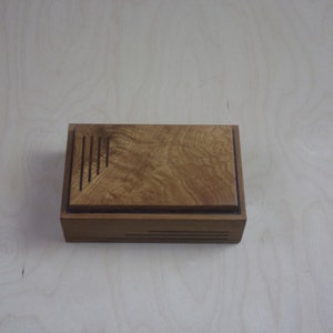 Handcrafted works of Art with a functional flair. Wooden trinket or keepsake box.