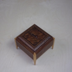 Walnut and Maple Legged Box with Fancy Walnut inlayed  top