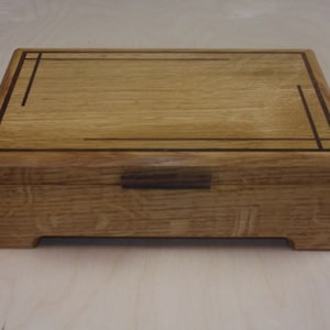 Watch box made with Quarter Sawn Oak Box Inlayed with Walnut
