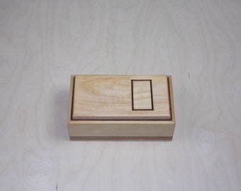 Maple box done in the modern art style inlayed with Fiddle Back Maple and Wenge