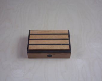 Handcrafted works of Art with a functional flair. Wooden trinket or keepsake box.