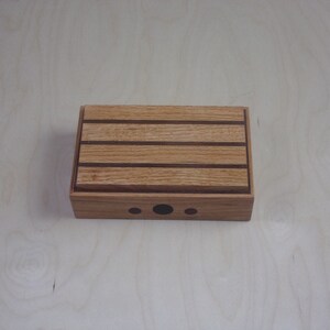Handcrafted works of Art with a functional flair. Wooden trinket or keepsake box.