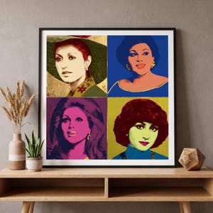 May include: A square wall art print featuring a four-panel grid of portraits of a woman in a pop art style. Each quadrant displays a different color scheme, including gold, blue, purple, and yellow, showcasing varied hairstyles and clothing.