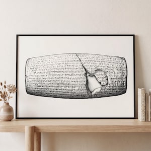 May include: A black and white line art print of a cylindrical clay tablet featuring dense cuneiform script. The illustration depicts the artefact with a prominent diagonal crack and a missing section on the right side, showcasing detailed texture.