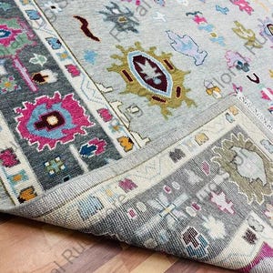 Handmade Pink Oushak Wool Rug: Muted Floral Turkish Style