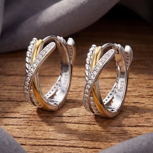 May include: A distressed wooden sign, reading "Welcome to our home" in white. The sign has a rustic finish, ideal for adding a welcoming touch to a front door or hallway.