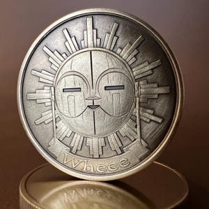 Moneda temática Wheee Whooo - Expedición 33 - Esquie