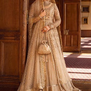 golden ethnic dress Golden dress of arabia stock photo. Image of accessories