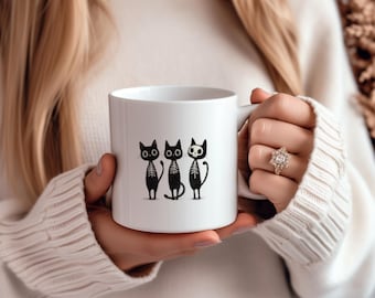 Cute Skeleton Cats Mug – Halloween Cat Lover Coffee Cup – Spooky Cute Ceramic Drinkware – Gothic Fall Gift – 11oz