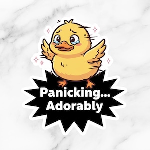 May include: A sticker featuring a yellow cartoon chick with a worried expression and tears. The chick is above a black speech bubble with the text "Panicking... Adorably". The sticker has a white border.