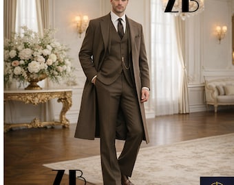 May include: A brown three-piece suit with a long overcoat. The suit includes a vest, trousers, and a jacket. The outfit is paired with a white dress shirt and a patterned tie. The image also includes the text "ZB" in the upper right and lower left corners.