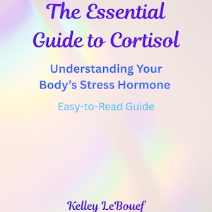 May include: A book cover with the title "The Essential Guide to Cortisol" in purple script. The subtitle reads "Understanding Your Body's Stress Hormone" with "Easy-to-Read Guide" below. The author's name, Kelley Le Bouef, is at the bottom.