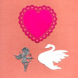 241 -lot 3découpes coeur et cygne et cupidon pour vos cartes ou scrapbooking