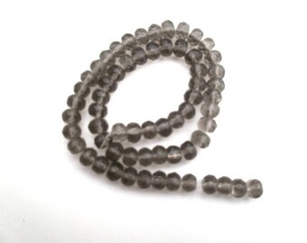 178 Lot  de  10  perles boulier en verre facetté  gris transparent