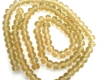 181 set of 10 yellow/green faceted glass beads