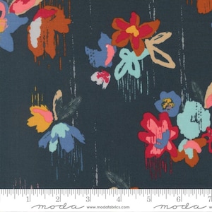 May include: Dark teal fabric with a floral pattern. The design features colorful flowers in shades of red, orange, blue, and pink, with white vertical streaks. The fabric has a ruler along the bottom edge.