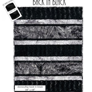 May include: Black and white striped fabric with a wavy pattern. The fabric is 58 inches by 68 inches.