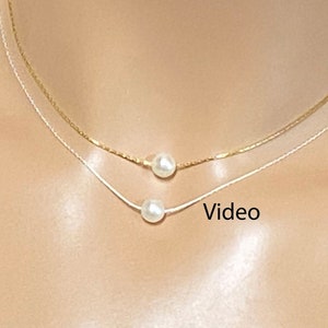 Solitaire Natural Freshwater Pearl is 4 to 6 mm diameter.  High quality AAA+ Pearl with thick pearl Nacre, high pearl luster, smooth surface, and even color.  One   mm Pearl on a fine beading chain with choice of Sterling Silver or 14K Gold Filled.