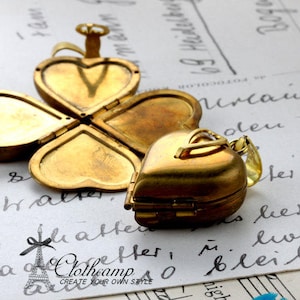 10pcs  Victorian Raw Brass Folding Heart Locket Charms Pendants/open into a clover / holding 4 photos(LOCK-75)