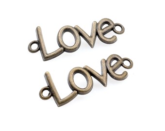 20 Stück Antike Bronze überzogene Legierung Liebeszauber, Antik Bronze Ton Metalllegierung Liebe Anhänger Schmuck Liefert 40.5x15.5mm (HAB-268)