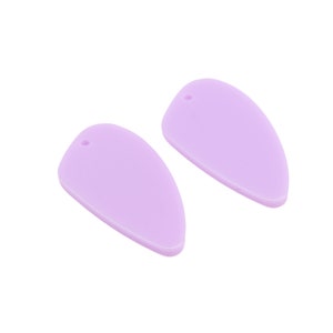 May include: Two light purple, teardrop-shaped acrylic charms with a hole at the top.