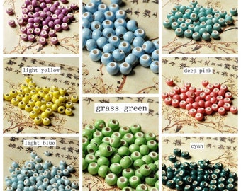 50 perles rondes en céramique de porcelaine de 6 mm (CAB-PC-1-16)