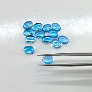 6 x 8 mm ovale topazio blu svizzero cabochon pietra preziosa naturale per la creazione di gioielli