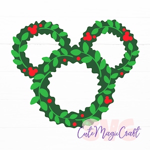 May include: A green wreath in the shape of a mouse head with two ears. The wreath is decorated with green leaves and red berries. The text "Cute Magic Craft" is in the bottom right corner.
