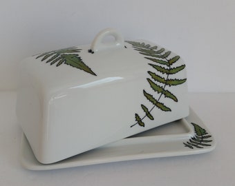 Nice handpainted  fern design on a white ceramic butterdish.