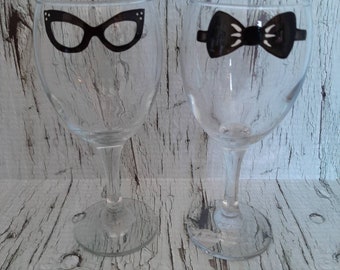 SALE - Elegante Cat eyes glasses or black bow tie designs hand painted on a nice wine glass