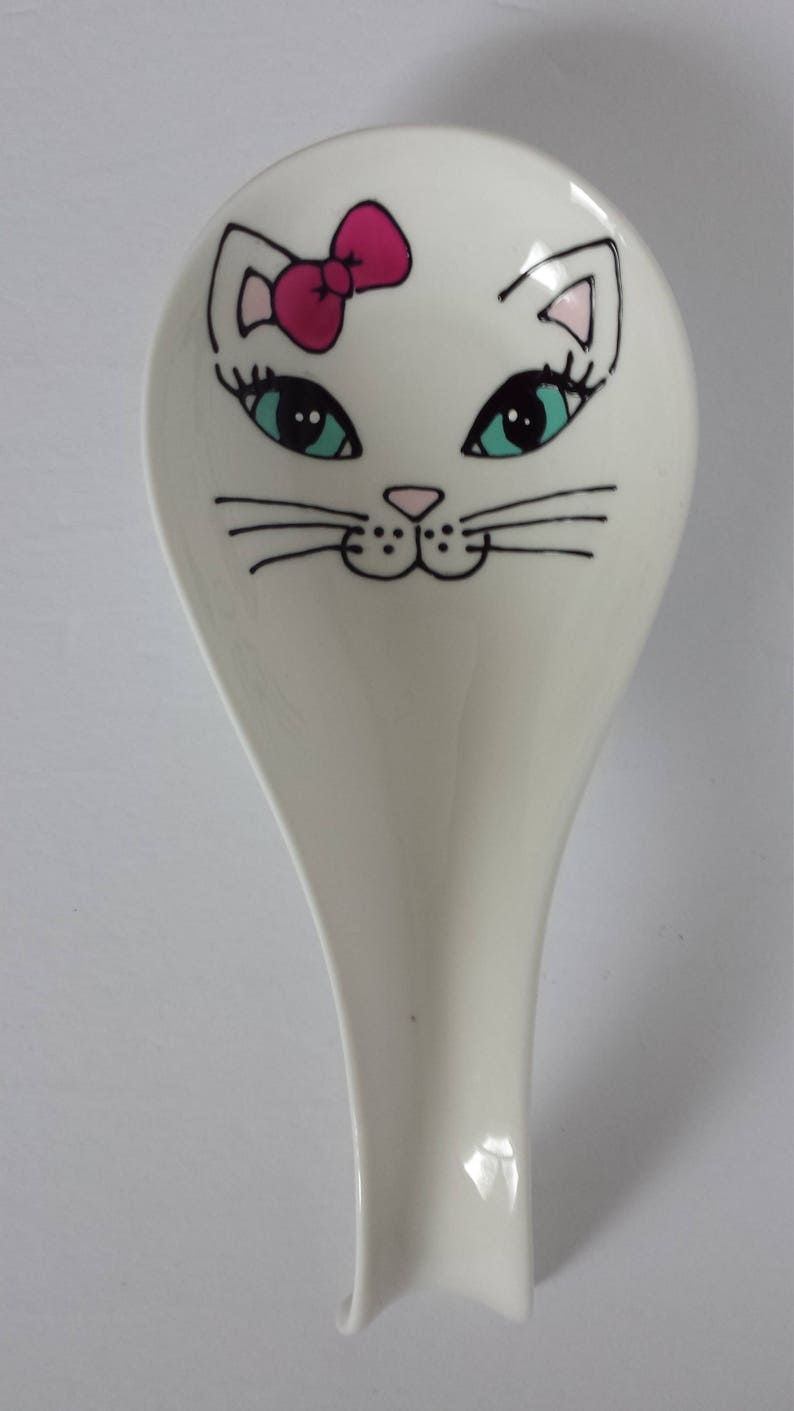 Handpainted girly cat face on porcelain spoon rest