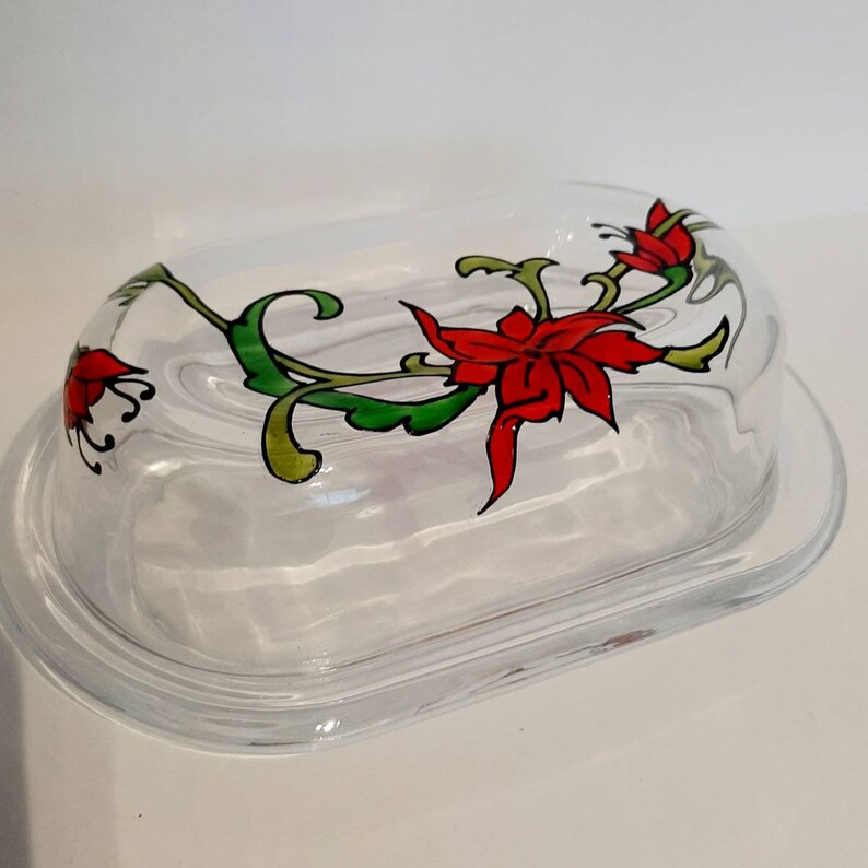 Handpainted red flower on a nice glass butterdish