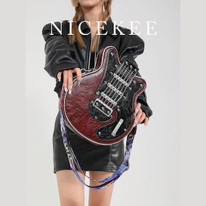 May include: A burgundy and black guitar-shaped handbag with a patterned strap. The bag has silver hardware and the word "NICEKEE" in white block letters at the top. The bag is held by a person wearing a black leather jacket and skirt.