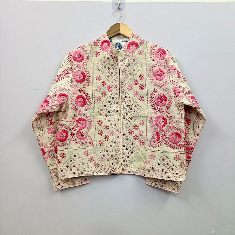 This elegant front open boho jacket is designed with full-length sleeves, a structured cropped silhouette, and soft breathable cotton fabric that offers both comfort and statement styling.