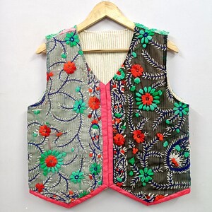 Bring vibrant artisan style to your wardrobe with this handmade embroidered Indian vest.