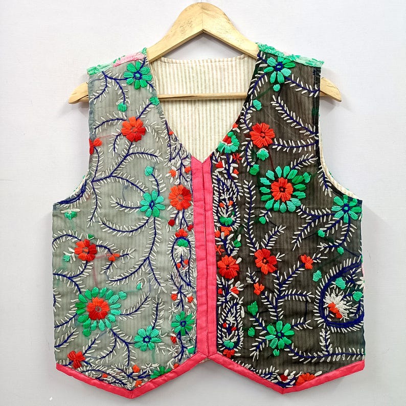 Bring vibrant artisan style to your wardrobe with this handmade embroidered Indian vest.