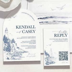 May include: Elegant wedding invitation suite featuring a lighthouse and coastal scene in navy blue. The suite includes an arched invitation, reply card, and envelope, with details about the ceremony and reception. The design incorporates seagulls and a sailboat.