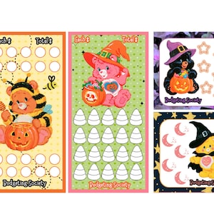 Può includere: Tre tracker di budget rettangolari e quadrati con orsetti dei cartoni animati in costume. Uno mostra un orso ape con zucca, uno un orso rosa da strega con icone di caramelle a forma di mais, e uno un orso nero con stelle e uno giallo con lune.