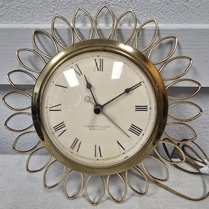Horloge murale vintage Westclox Sunburst : marguerite moderne Mid-Century en laiton