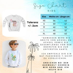 May include: White kids' sweatshirt with a cartoon illustration and the number 5. The image also includes a size chart with measurements in centimeters, and text in German. The chart lists sizes XS to XL with corresponding width and length measurements.