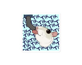 May include: A white rat with a pink nose and black eyes is licking a blue object. The background is a light blue with the word "Tiktok" repeated in dark blue.
